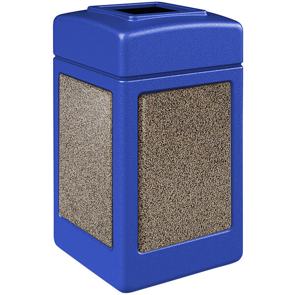 A blue square Commercial Zone StoneTec waste receptacle with brown square panels.