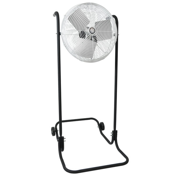 A large TPI industrial floor fan with a white tilt head on a stand.