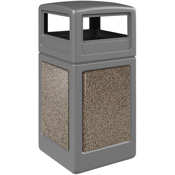 A grey Commercial Zone StoneTec rectangular trash can with brown dome lid and riverstone panels.