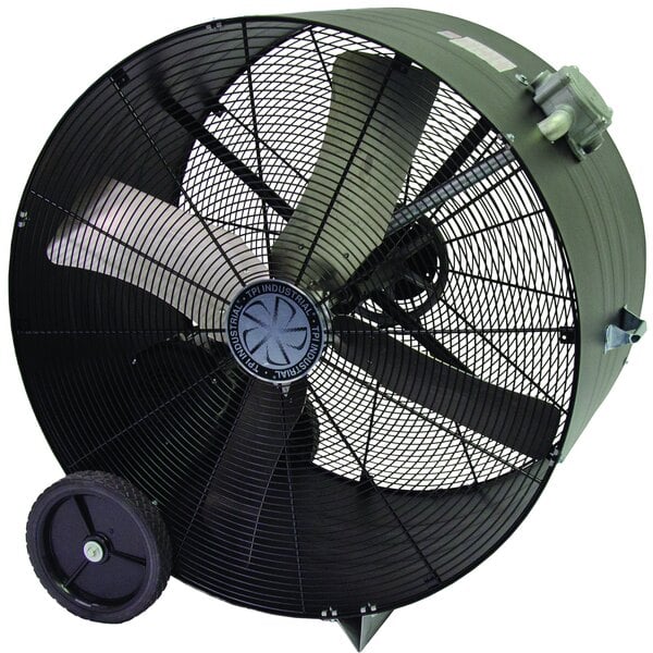 A large black TPI industrial fan with wheels.