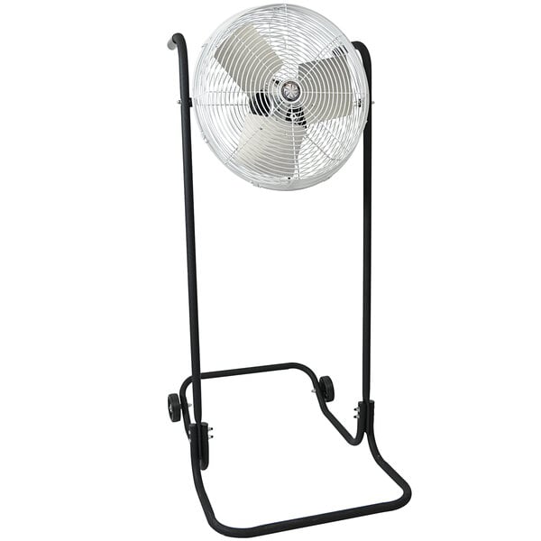 A white TPI industrial floor fan on a stand.