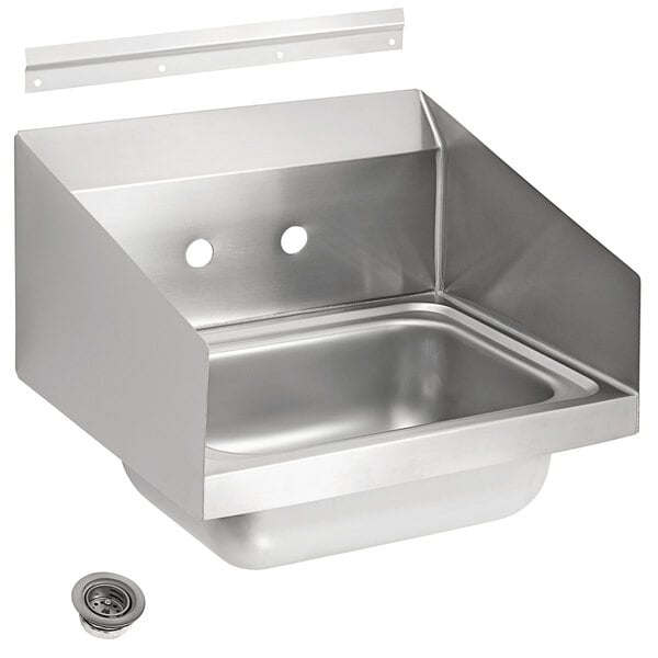 A close-up of a Vollrath stainless steel hand sink with a drain and hole for a faucet.