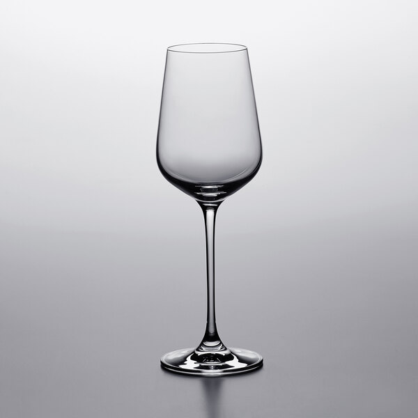 A close up of a Lucaris Chardonnay wine glass on a table.