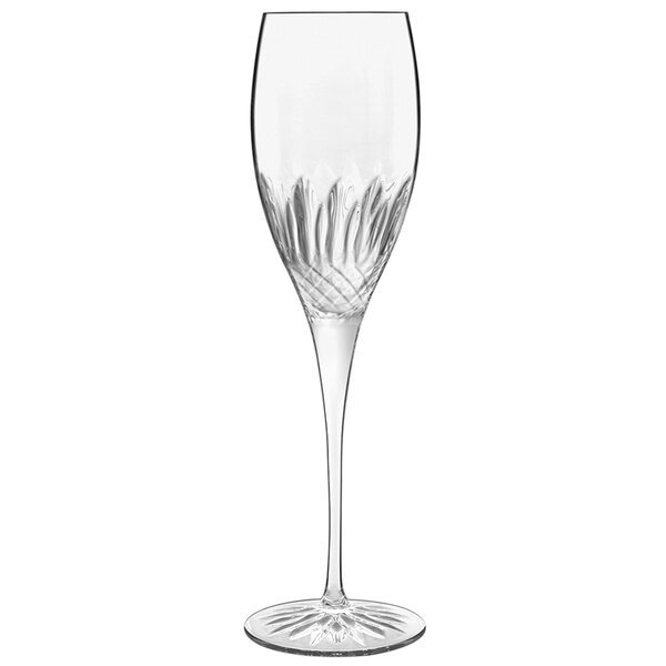 A Luigi Bormioli Diamante champagne flute with a curved stem and a design on it.