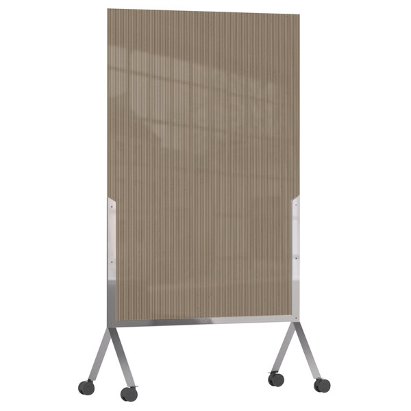 A bronze metal room divider with glass panels on wheels.