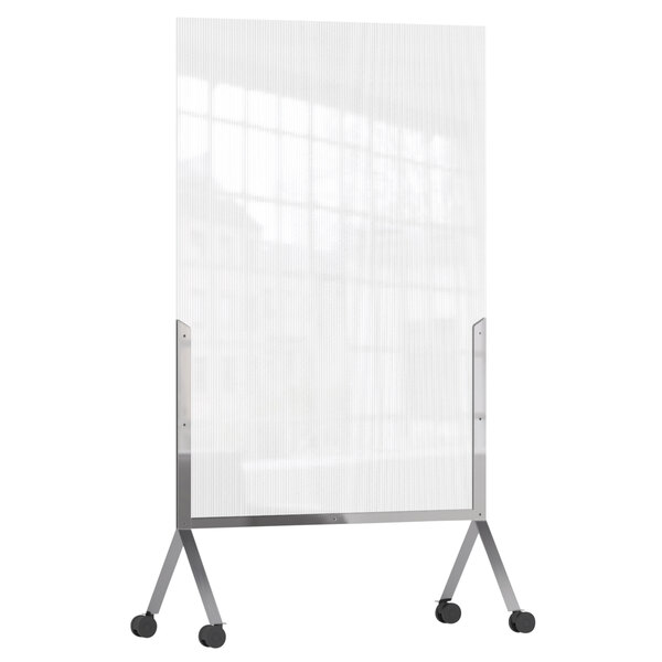 A clear room divider with metal legs and wheels.