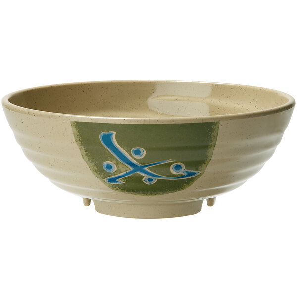 A GET Japanese Traditional melamine bowl with a blue and white design on a green surface.