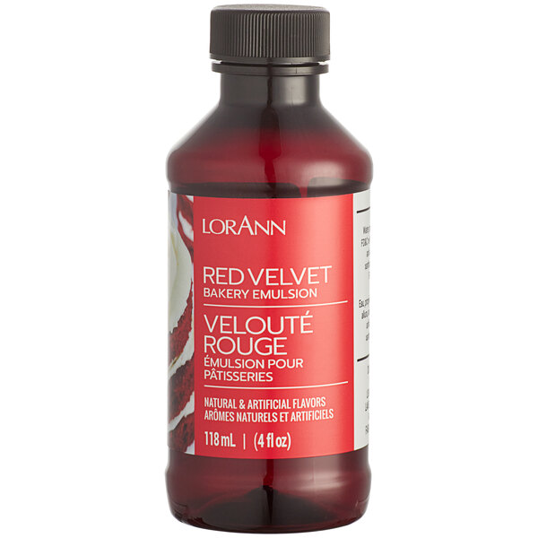 A 4 fl. oz. bottle of LorAnn Oils Red Velvet Bakery Emulsion with red liquid inside.