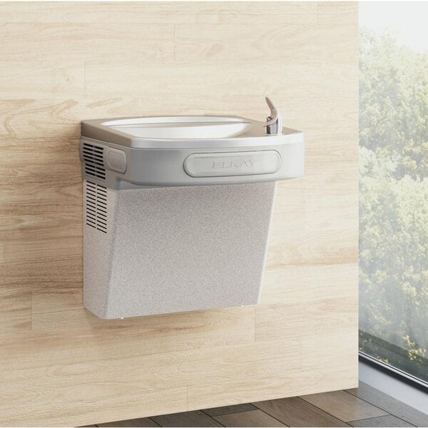 An Elkay wall mount drinking fountain with a water cooler and extra deep basin.