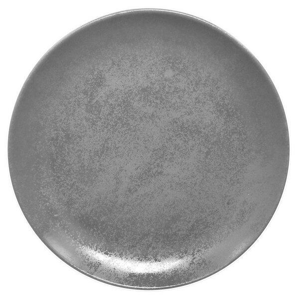 A close up of a grey RAK Porcelain flat coupe plate with a speckled surface.