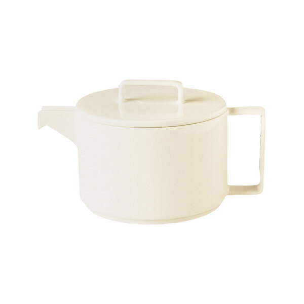 A white RAK Porcelain teapot with a lid.