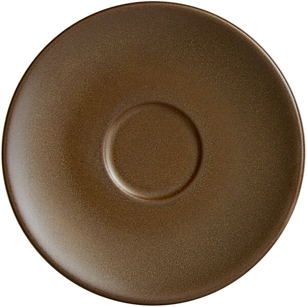A brown RAK Porcelain saucer with a rim and a circle in the middle.