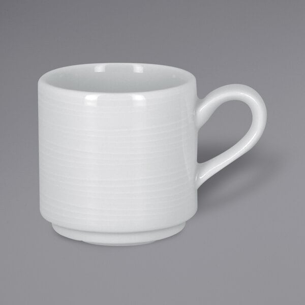 A RAK Porcelain bright white espresso cup with a handle.