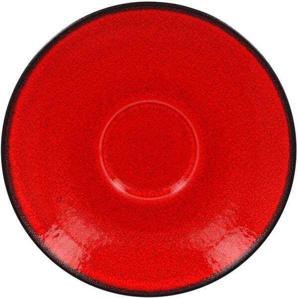 A red porcelain saucer with a black rim.