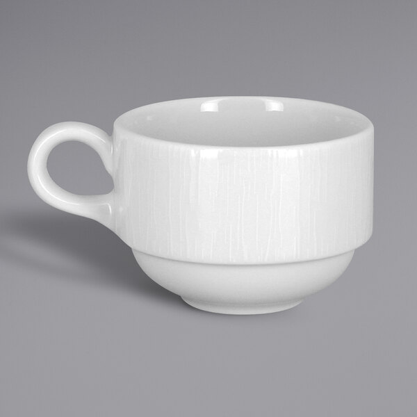 A white RAK Porcelain stackable cup with a white handle.