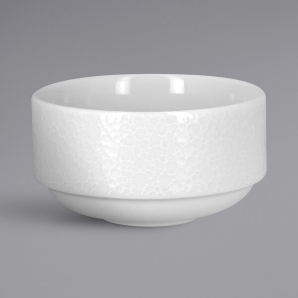 A RAK Porcelain bright white porcelain bouillon cup with an embossed design.
