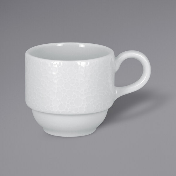 A RAK Porcelain bright white espresso cup with a white handle.