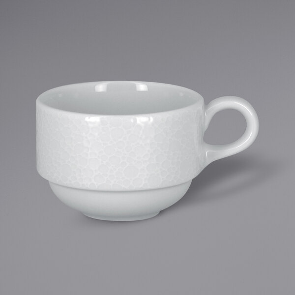 A white RAK Porcelain Charm tea cup with a handle.