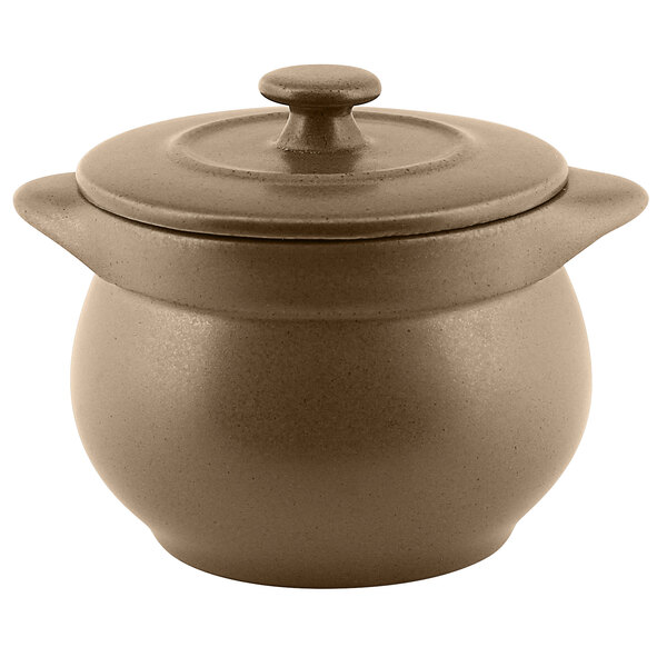 A brown porcelain soup tureen with lid.