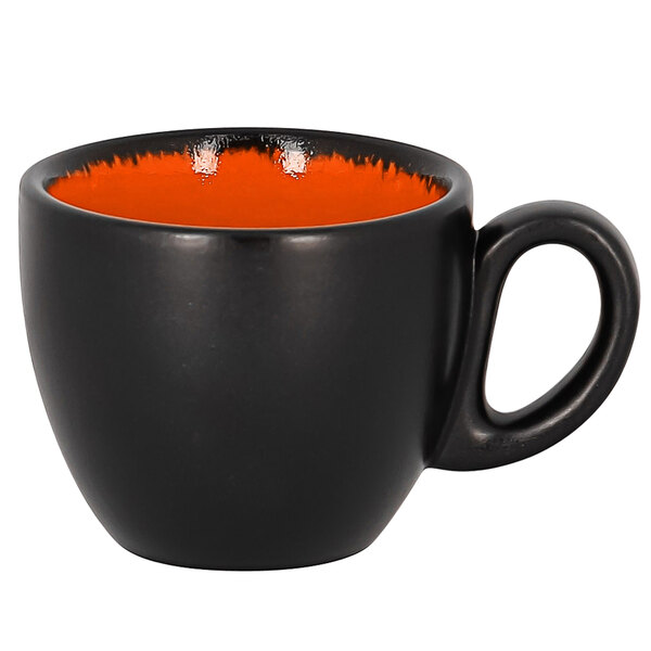 A black and orange RAK Porcelain espresso cup with a handle.