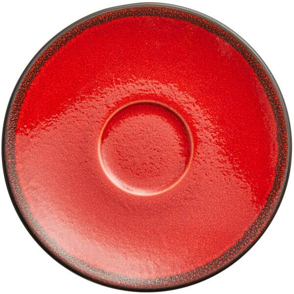 A red RAK Porcelain saucer with a rim.