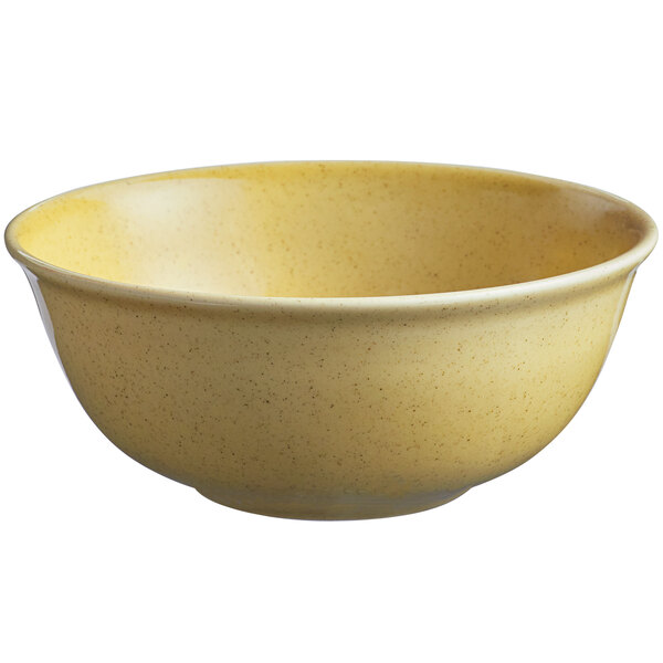 A close up of a yellow RAK Porcelain rice bowl with a speckled texture.