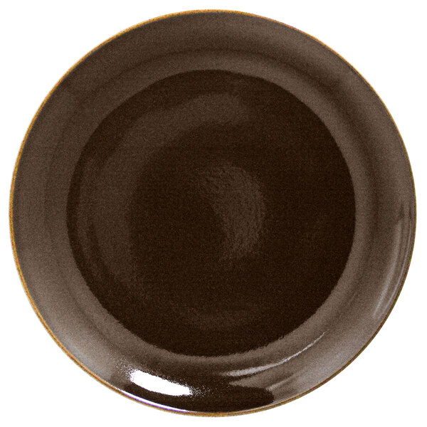 A brown RAK Porcelain coupe plate with a rim.