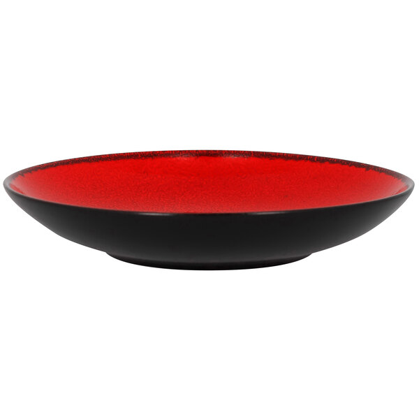 A red and black RAK Porcelain deep coupe plate.