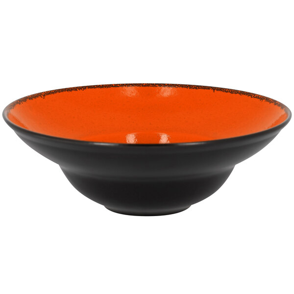 A black bowl with an orange rim.