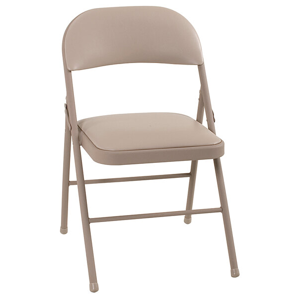 A tan Bridgeport Essentials vinyl padded folding chair with a backrest and cushion.
