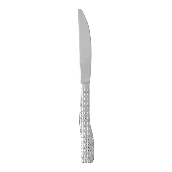 A Fortessa stainless steel table knife with a textured handle.