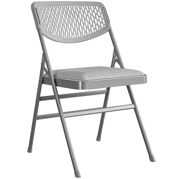 A Bridgeport Essentials gray resin folding chair with a gray fabric padded seat and mesh back.