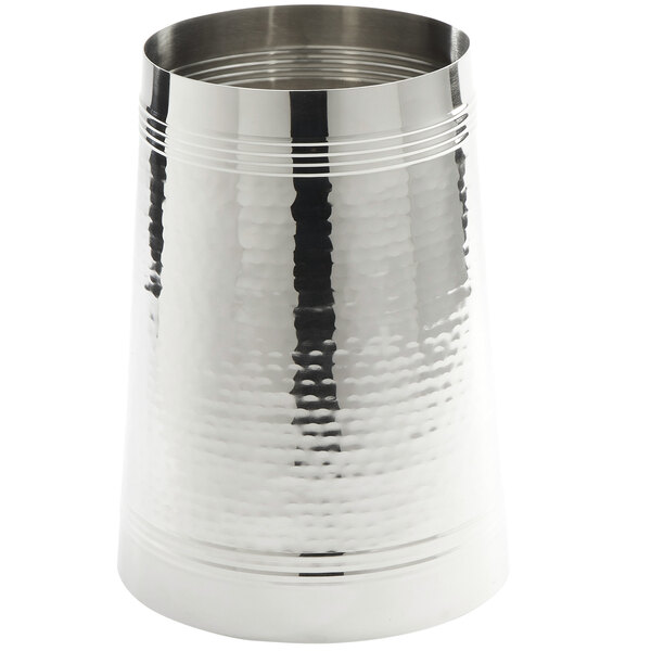 A silver metal cylinder base with a textured surface.