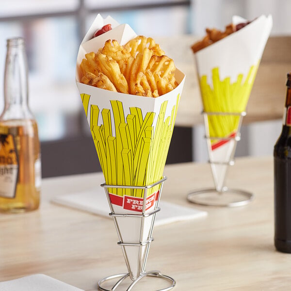 A Carnival King cardboard fry cone filled with French fries on a table.