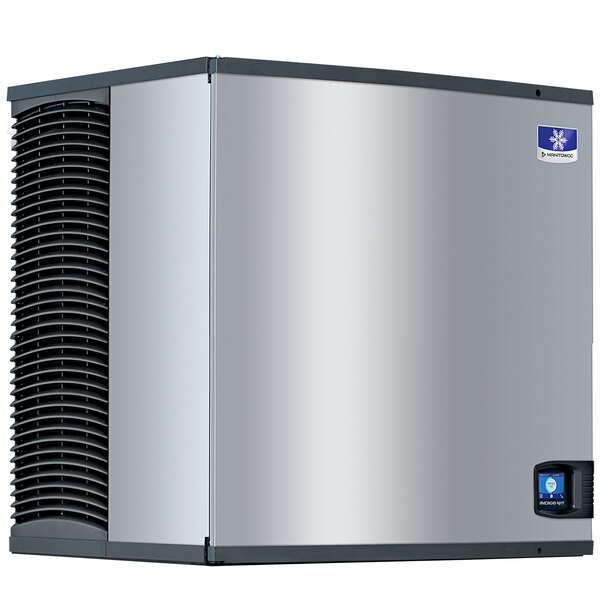 A silver rectangular Manitowoc IYF0900A-263A ice machine with a blue and white logo.