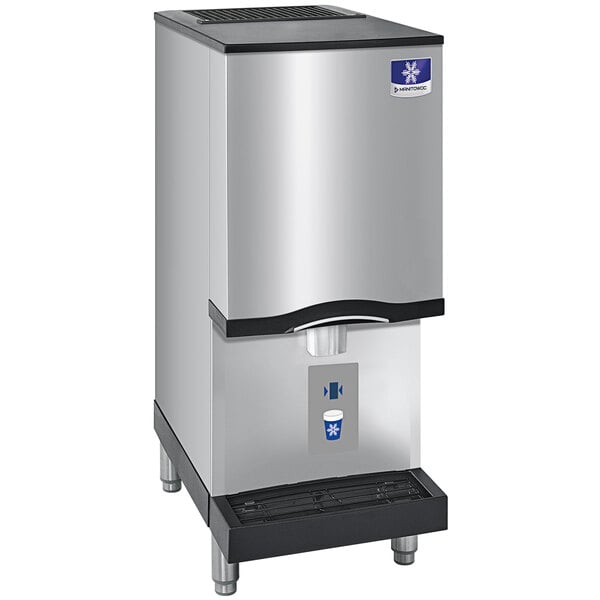 A stainless steel Manitowoc countertop nugget ice maker with a black and silver water dispenser.