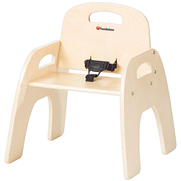 A Natural wood child's chair with a black strap.