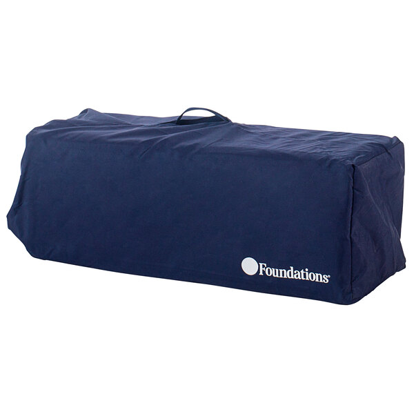 A blue Foundations Celebrity Regatta playard carry bag with white text and a handle.