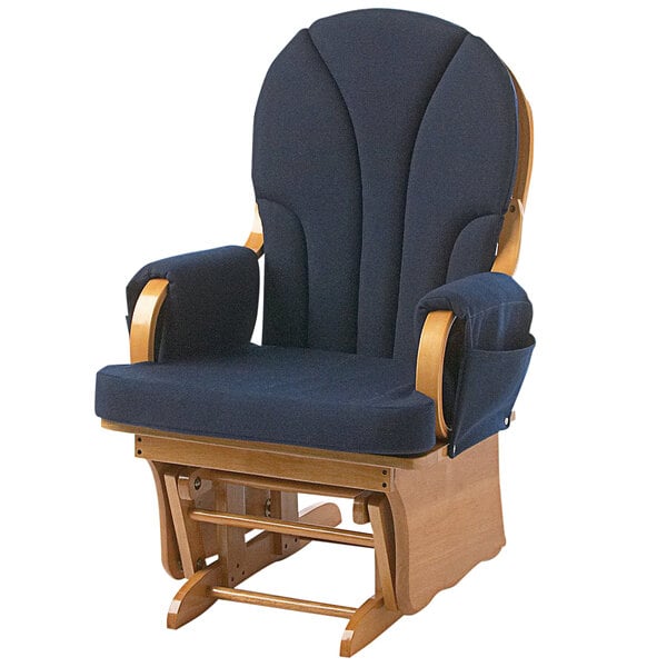 A natural wood glider rocker with navy cushions on a wooden frame.