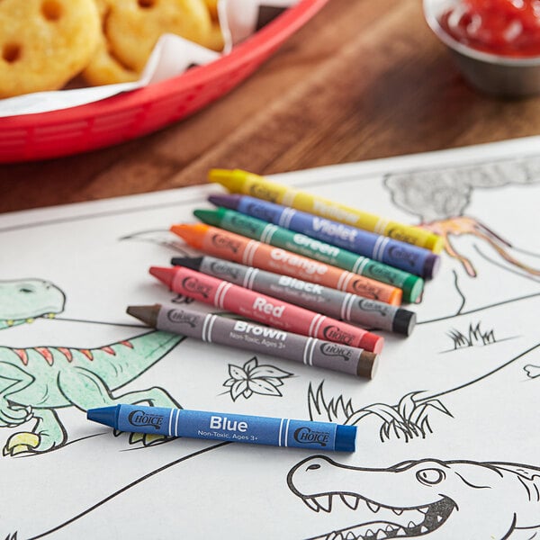 A box of blue Choice crayons on a table with a coloring page and food.