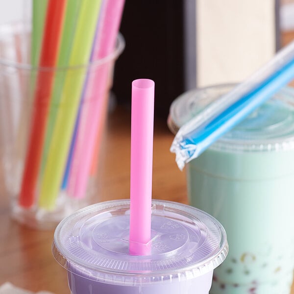 A Choice neon straw in a plastic cup.
