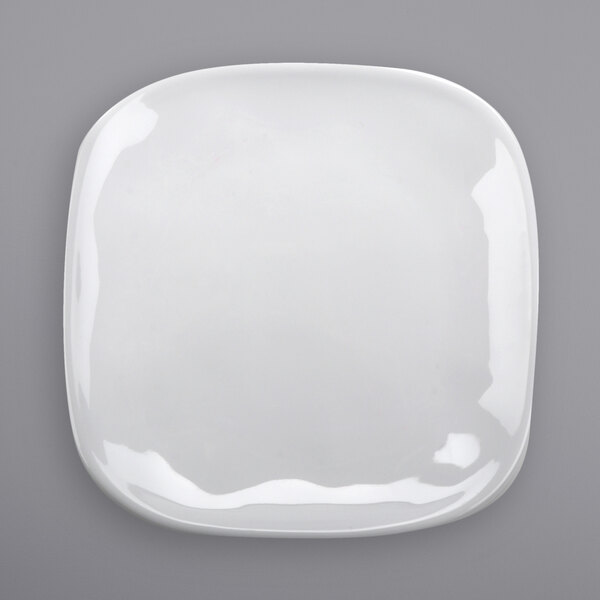 A white irregular square melamine plate.
