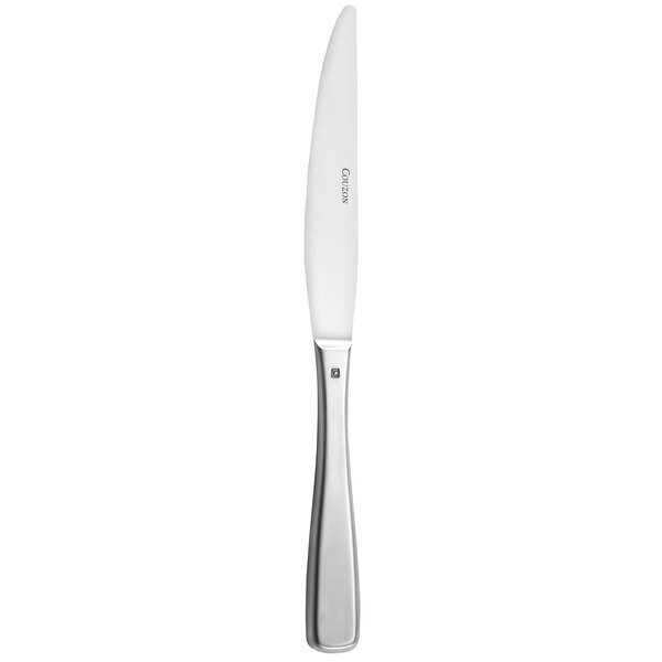 A silver Couzon by Amefa stainless steel dessert knife with a white handle.