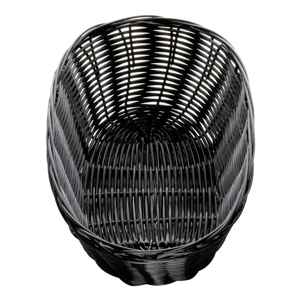 A Tablecraft black oval rattan basket with a handle.