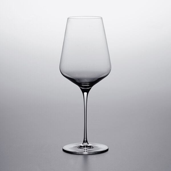 A Stolzle Bordeaux wine glass on a white background.