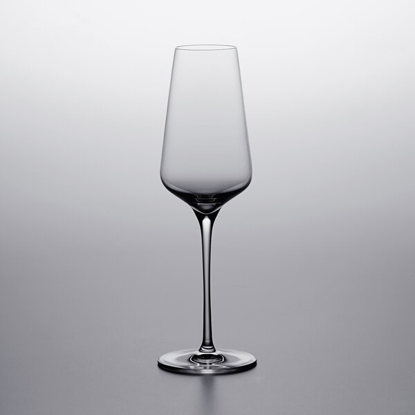 A Stolzle STARlight flute wine glass on a table.