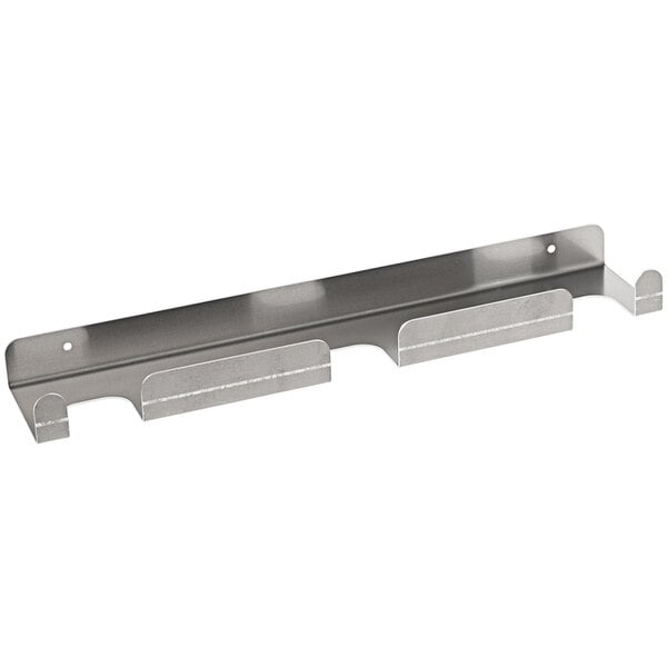 A white metal wall rack with three slots.