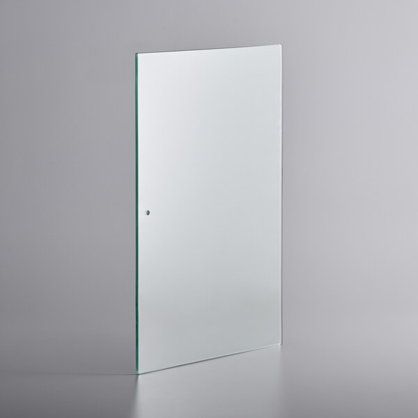 An Avantco glass door with a round knob on a white background.