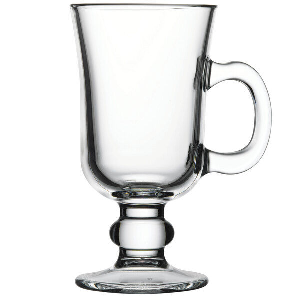 A clear glass Pasabahce Irish coffee mug with a handle.