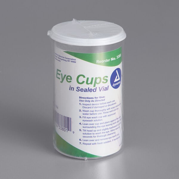A plastic vial containing 6 Medique plastic eye cups.